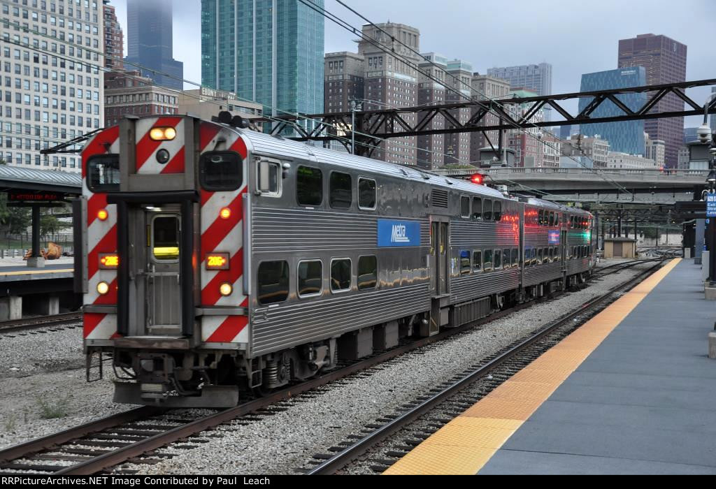 Outbound commuter approaches the station